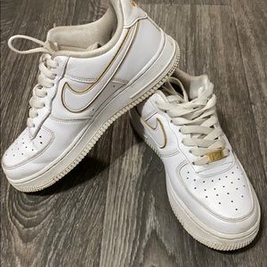 Nike Air Force 1’s with gold lining. Pre-owned